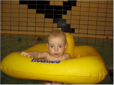 This was the major coup of the afternoon: a little baby flotation ring thing.  Molli loved it.  We have a 3.5MB video of her bobbing around in it while Vibeke, Mette, and Trine lob those little balls at her.  It's like a recreation of some ancient sea batttle.  In fact, I may modify the audio and post it on JustMorons as precisely that.  But I'll email the video to anyone who requests it.